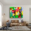 Geometric abstract art piece by Selda Bergman on the gray wall